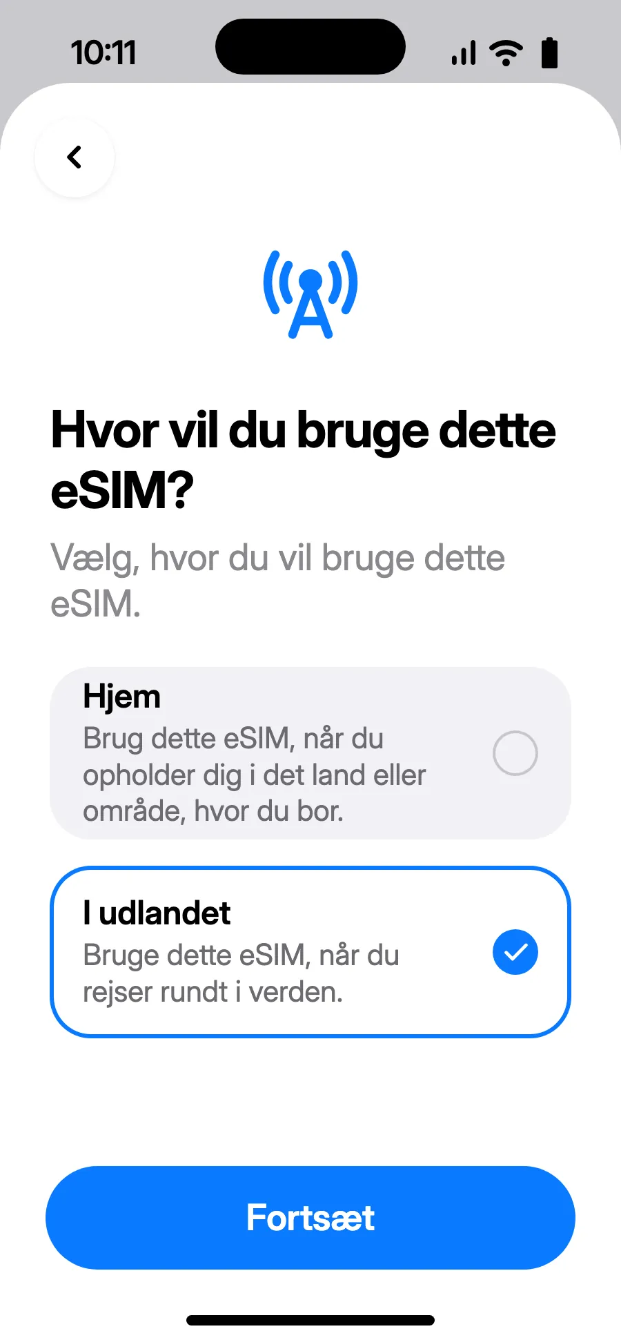 Vælg “I udlandet”, og tryk på Fortsæt.