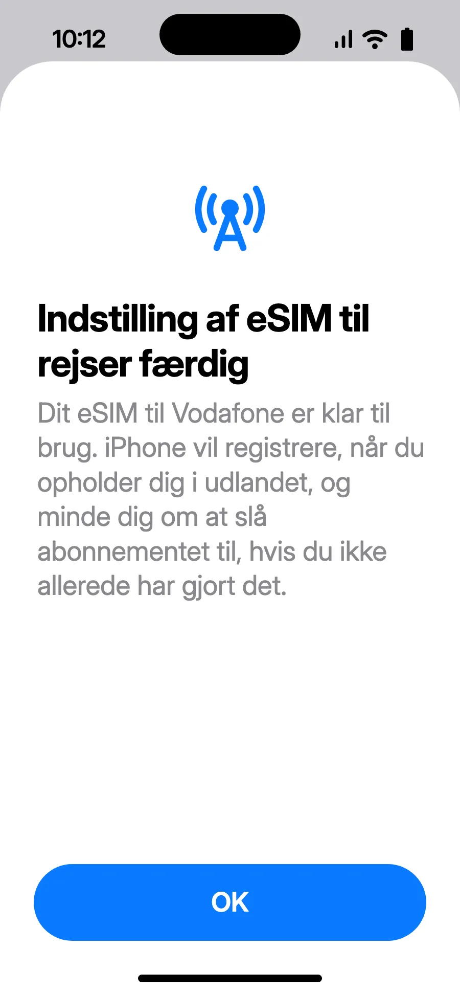 Tryk på OK. Din iPhone minder dig om at slå eSIM'et til i udlandet.