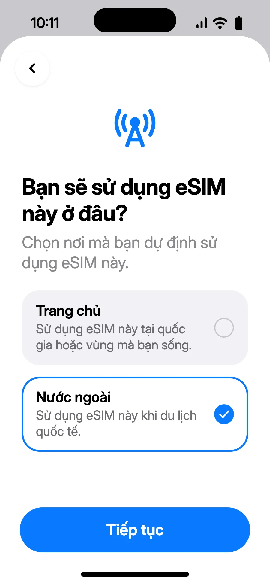 Chọn “Nước ngoài”, rồi chạm Tiếp tục.